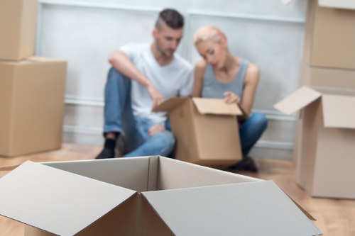 Professional movers loading furniture with care in Uxbridge