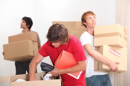 Packed boxes and electronics prepared for a student move in Uxbridge