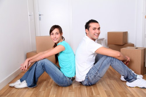 Professional movers assisting with a flat removal in Uxbridge