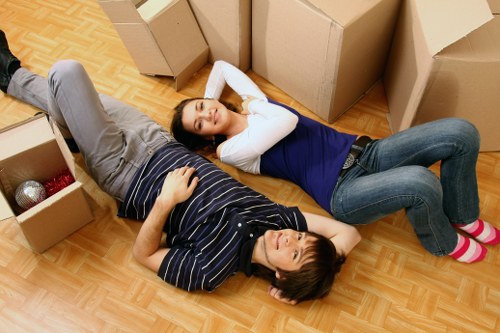 Furniture collection team handling access challenges in Uxbridge